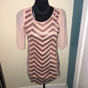 A pink dress with pink sequins